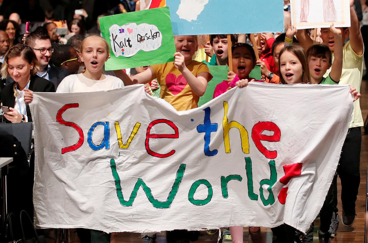 Children are seen during climate march prior to the opening session of the COP23 UN Climate Change Conference 2017 in World Conference Center Bonn, Germany. REUTERS file photo