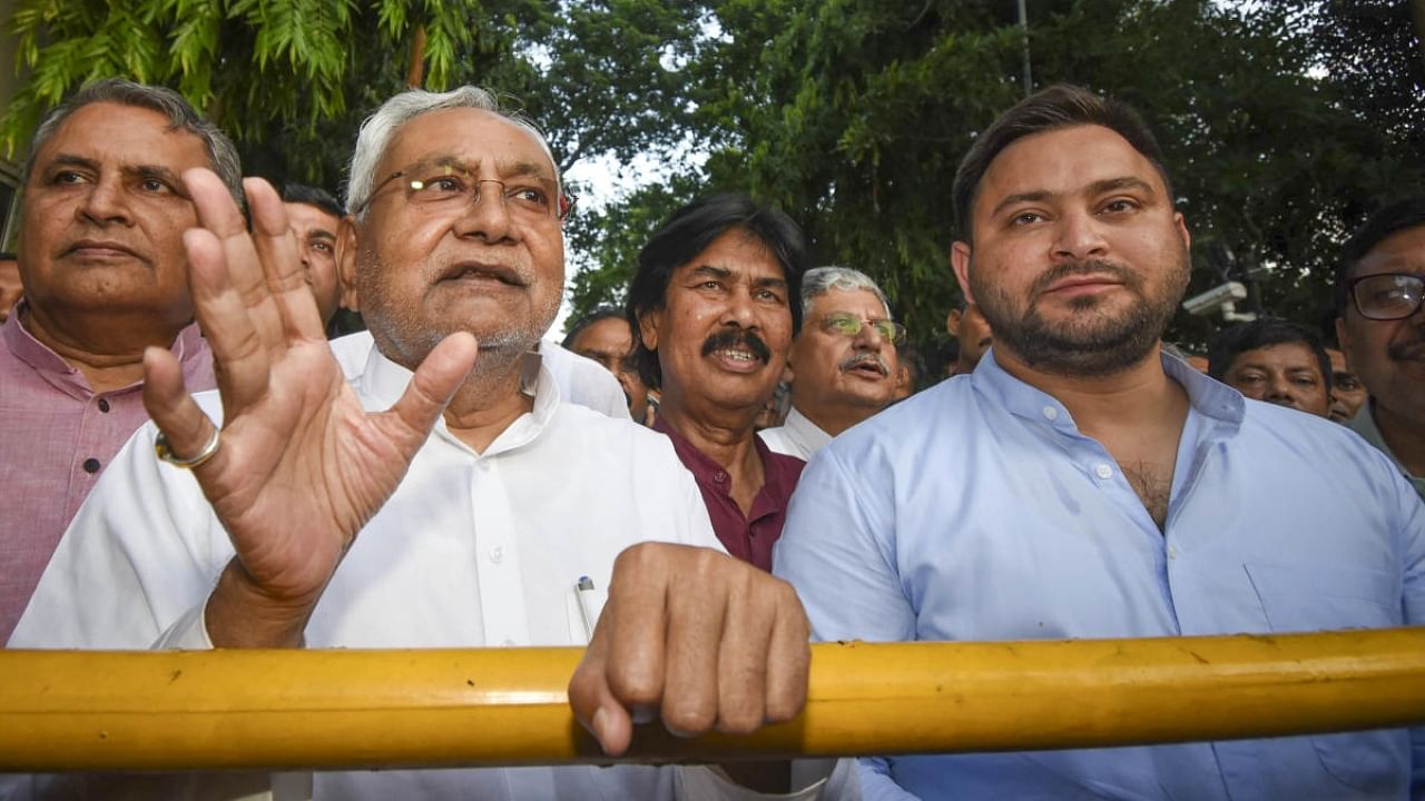 Janata Dal (United) leader Nitish Kumar with Rashtriya Janata Dal leader Tejashwi Yadav. Credit: PTI Photo