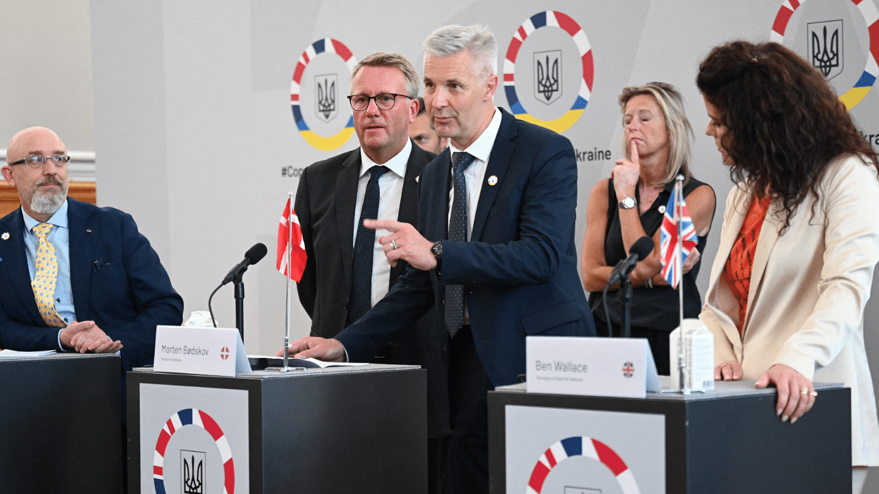 Latvia's Minister of Defence Artis Pabriks (C R) gestures during the closing press statement after a donor conference, together with Ukrainian Minister of Defence Oleksii Reznikov (L) and Danish Minister of Defence Morten Bodskov (C L). Credit: AFP Photo