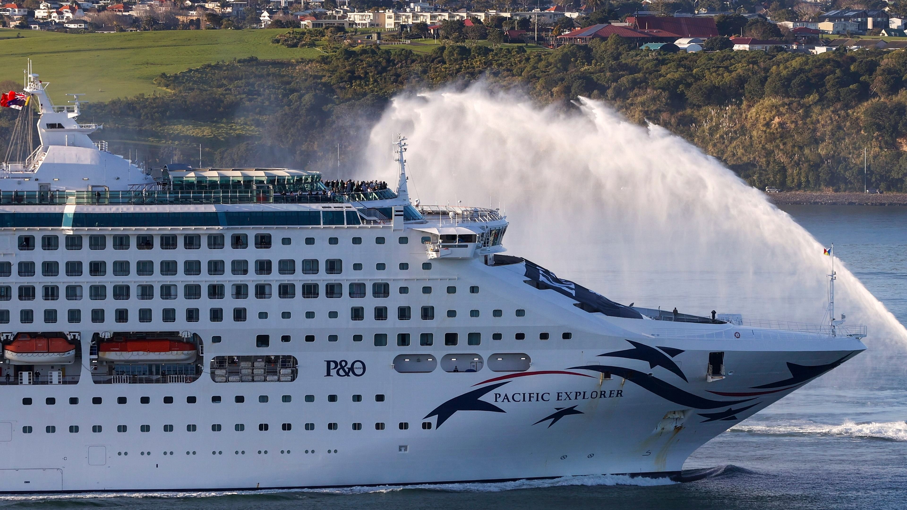 The Pacific Explorer sails into the Waitemata Harbour, in Auckland, New Zealand, Friday, Aug. 12, 2022. New Zealand has welcomed the first cruise ship to return since the coronavirus pandemic began, signaling a long-sought return to normalcy for the nation's tourism industry. Credit; AP/PTI Photo
