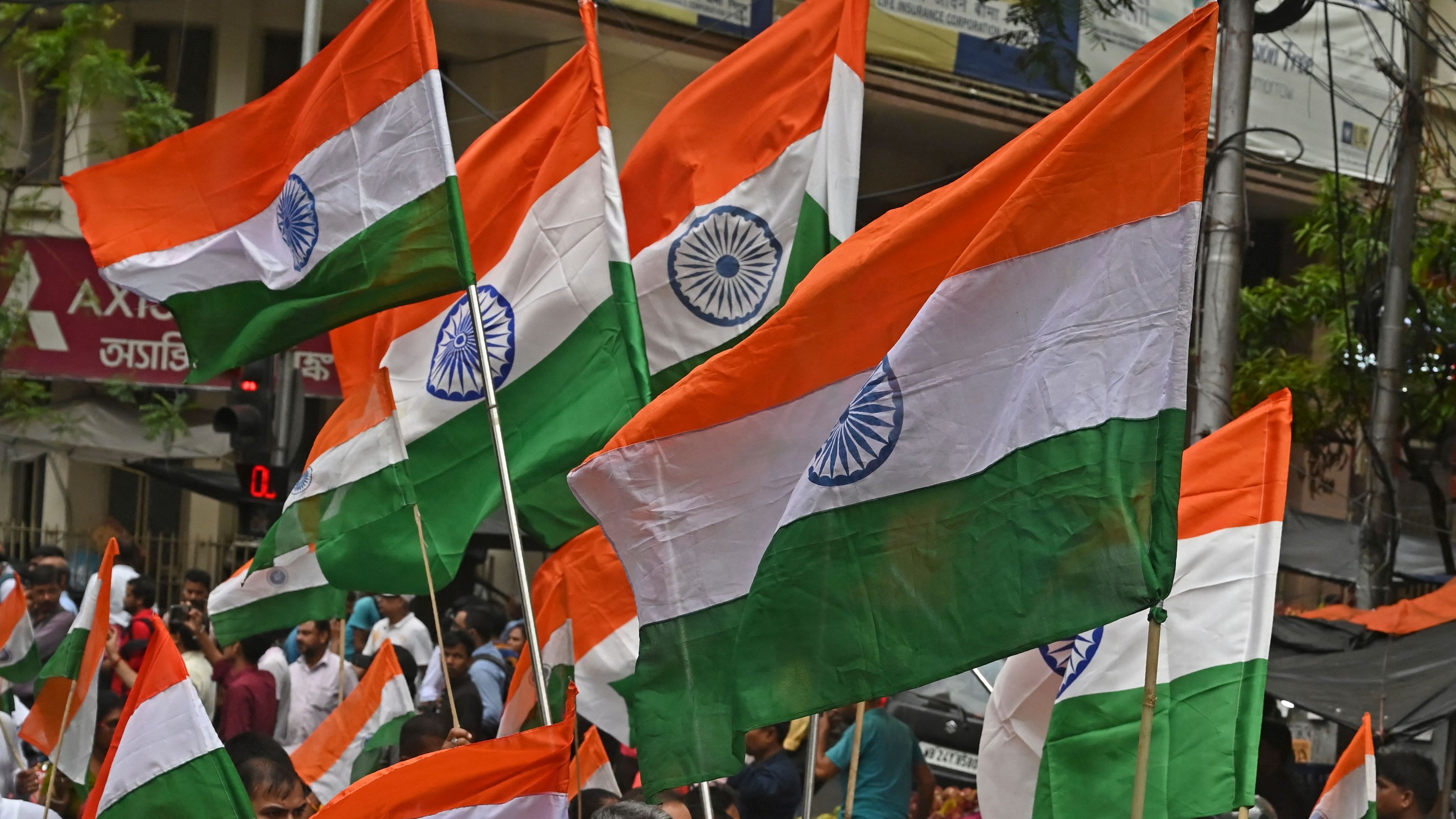 The flag, stripes of saffron, white and green stacked in that order with the Ashoka Chakra for a pendant, came from decades of evolution. Credit: AFP File Photo