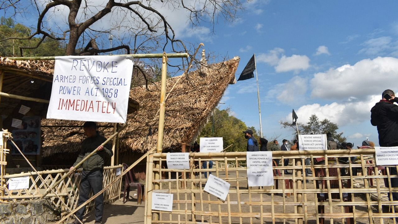 lacards and black flag are put up at the venue of Hornbill festival in solidarity with the civilians, killed in an anti-insurgency operation, in Kisama. Credit: PTI Photo