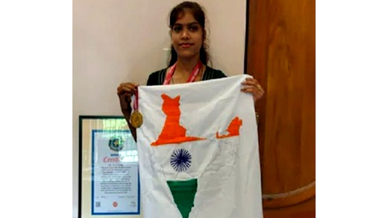Kiran Singh with her embroidered map of India. Credit: IANS Photo