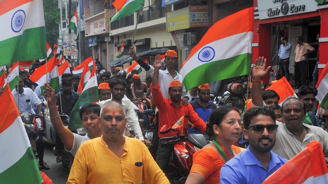 People holding the national flag participate in a 'Tiranga Yatra'. Credit: PTI File Photo/Representative