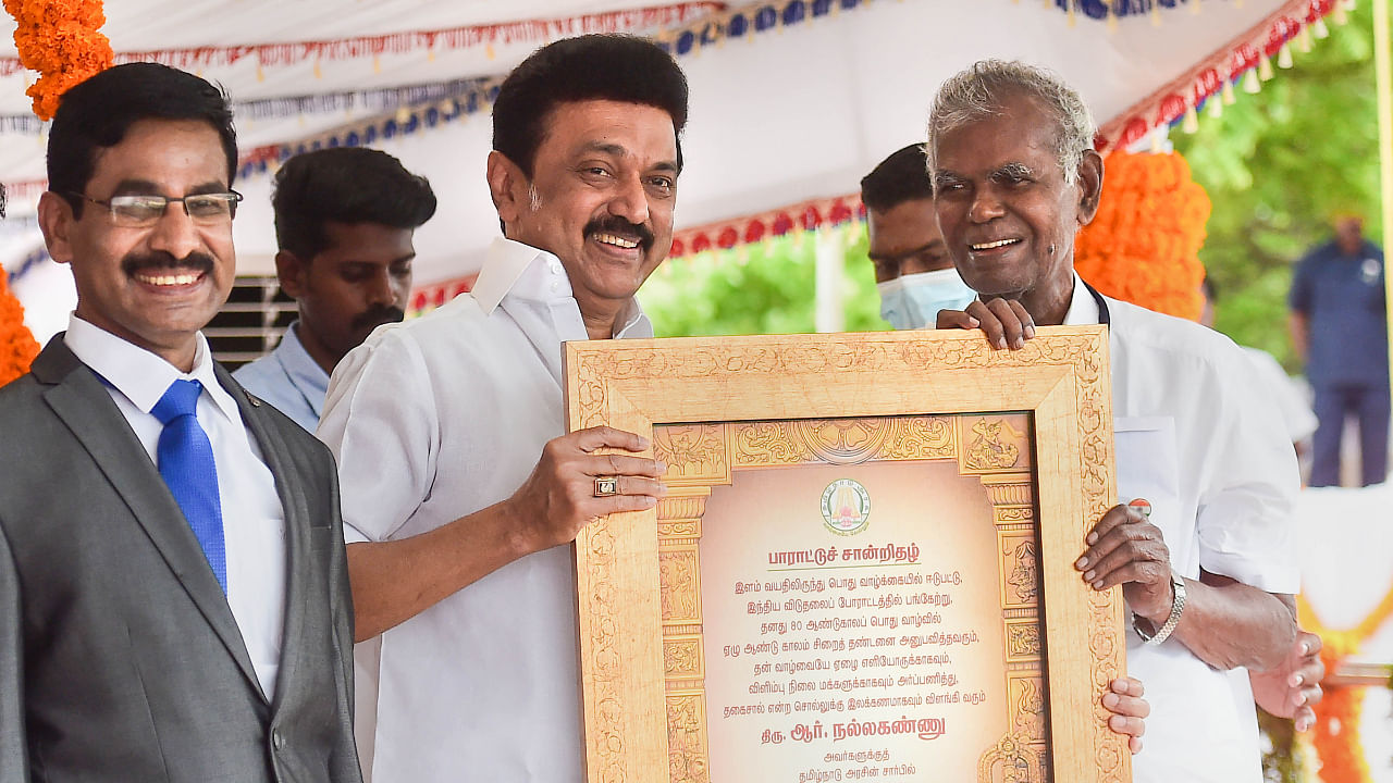 M K Stalin presents the 'Thagaisal Thamizhar' award to veteran CPI leader R Nallakannu on I-Day, August 15, 2022. Credit: PTI Photo