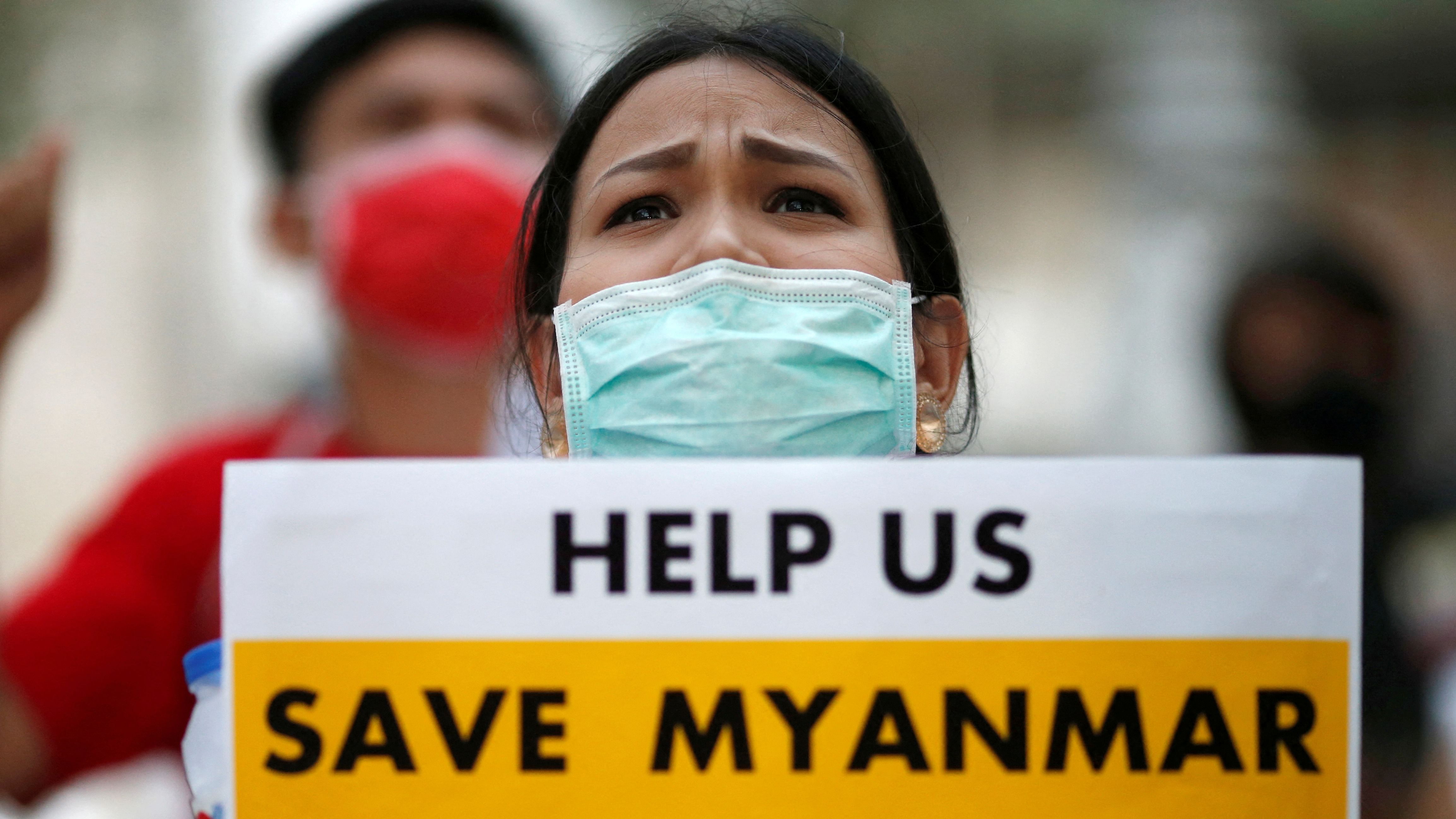 Myanmar citizens protest against the military coup in front of the UN office in Bangkok, Thailand. Credit: Reuters Photo