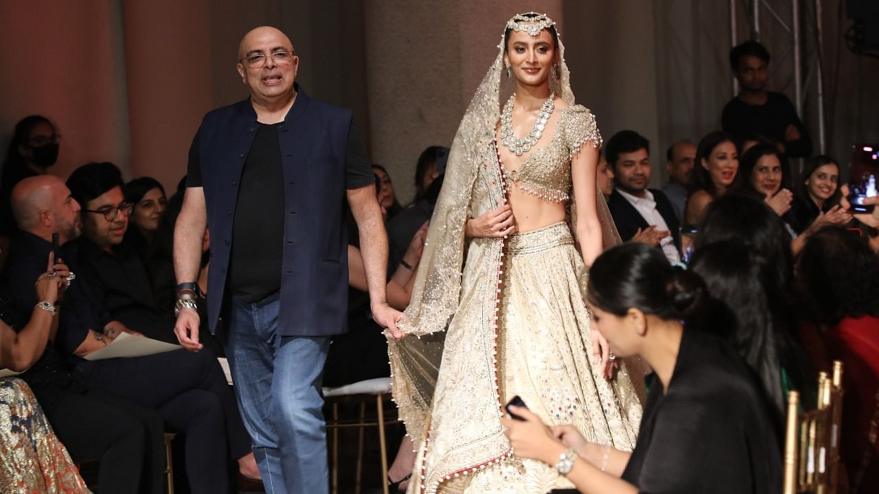 Tarun Tahiliani presented his bridal couture line at FDCI India Couture Week 2022 recently.  Credit: Shashi Sunny