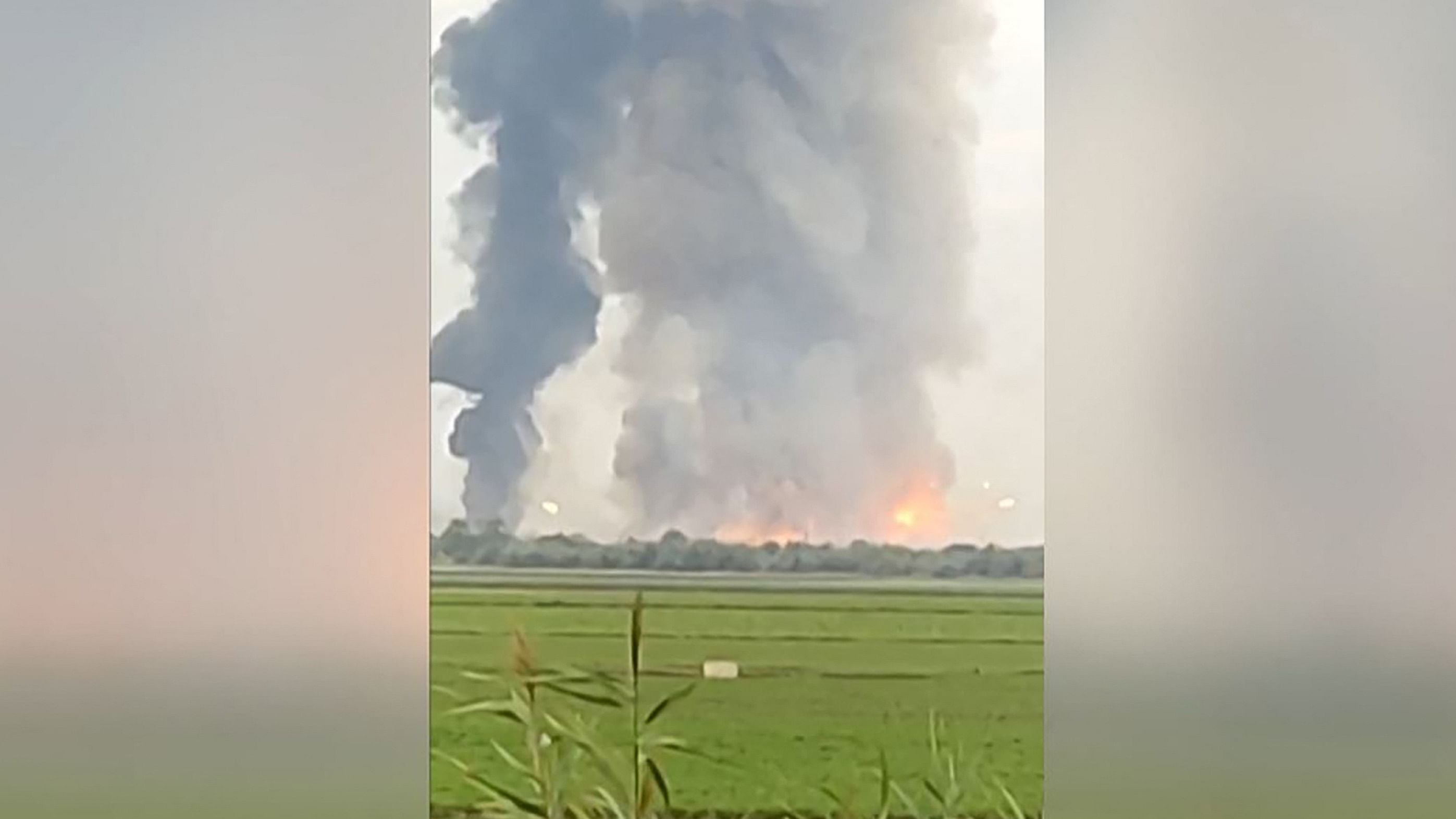This still frame from a UGC video taken with a smartphone and released on the ESN platform on August 16, 2022 shows fire and smoke billowing from munitions depot in Crimea early on August 16, 2022. Credit: AFP Photo