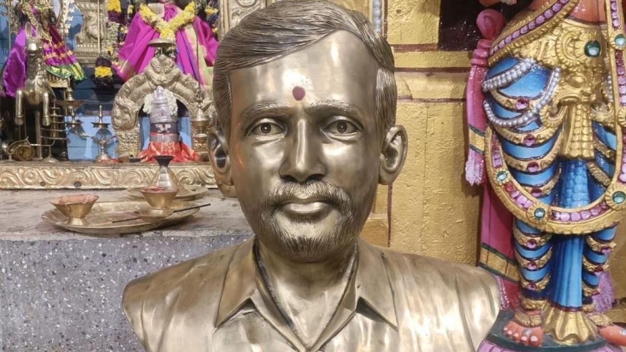 The metal bust of Forest officer P Srinivas at Maramma temple in Gopinatham village. Credit: DH Photo