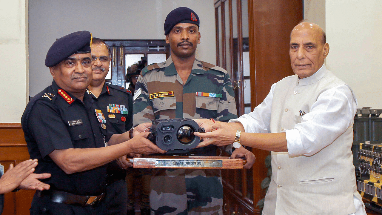 Rajnath Singh hands over F-INSAS and other equipments to Army. Credit: PTI Photo