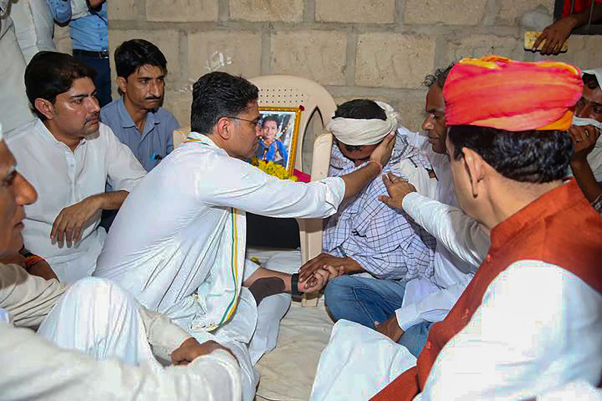 Congress leader Sachin Pilot meets the bereaved family of nine-year-old Dalit boy who died allegedly after he was assaulted by a teacher in his school, in Jalore district of Rajasthan, Wednesday. Credit: @sachinPilot