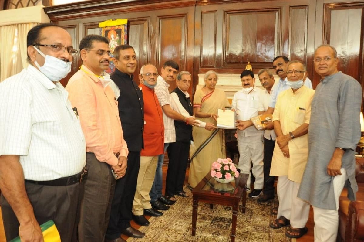 A delegation of arecanut growers led by Jnanendra met Union Finance Minister Nirmala Sitharaman and Commerce Minister Piyush Goyal, seeking measures to protect the interests of domestic arecanut growers. Credit: Special arrangement