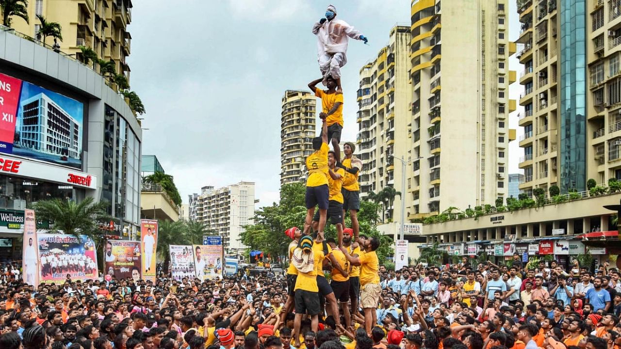 In big cities, like Mumbai and Thane, Dahi Handi events have attracted politicians as a way of distributing patronage at the local level. Credit: PTI Photo