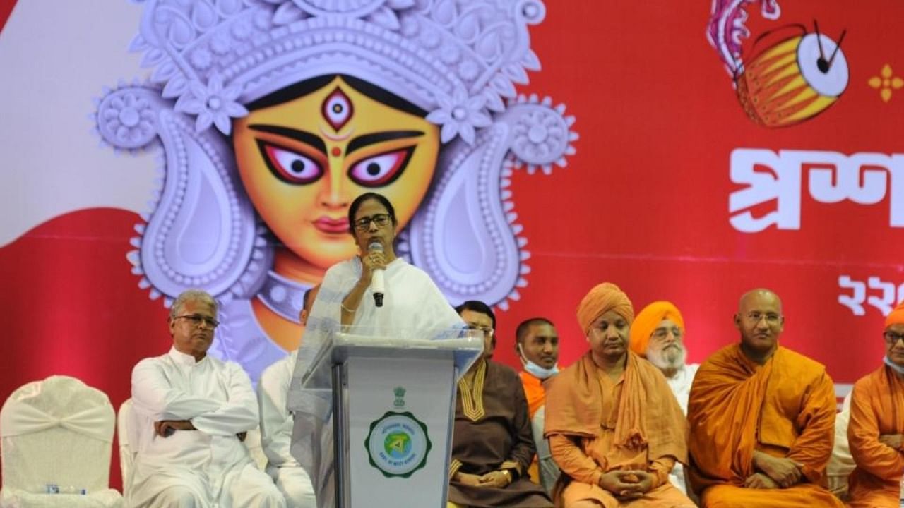  West Bengal Chief Minister Mamata Banerjee addresses during the administrative meeting with different Durga Puja organizers for upcoming Durga Puja festival, in Kolkata on Monday, August 22, 2022. Credit: IANS Photo