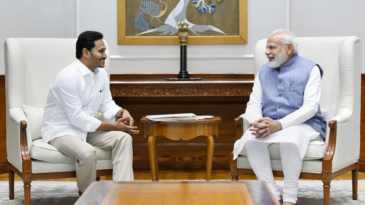 Prime Minister Narendra Modi interacts with Andhra Pradesh Chief Minister Y S Jaganmohan Reddy during a meeting, in New Delhi. Credit: PTI Photo