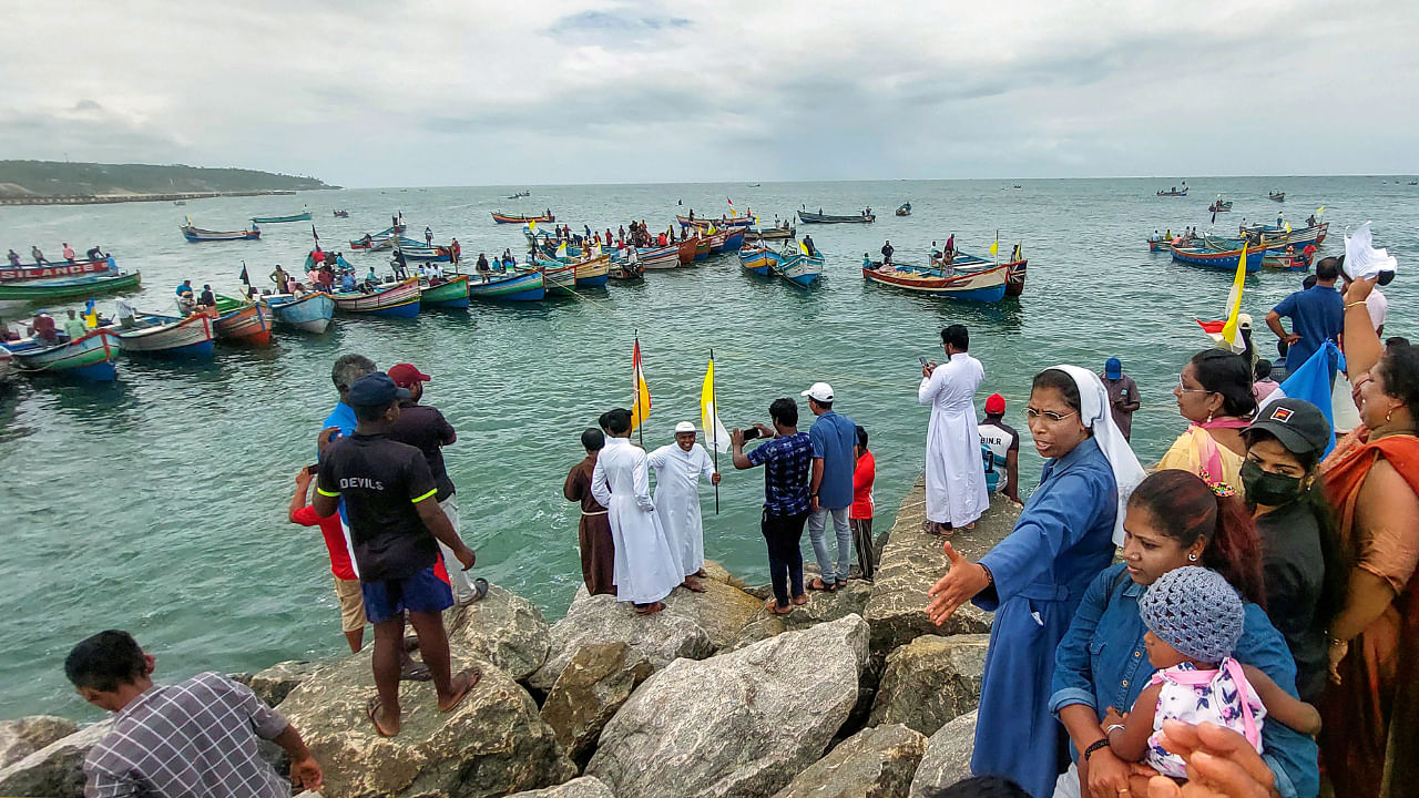 Fishers and citizens using their fishing boats lay siege to Adani port during their protest against Adani Group's port development project at Vizhinjam, in Thiruvananthapuram, Monday, Aug. 22, 2022. Credit: PTI Photo