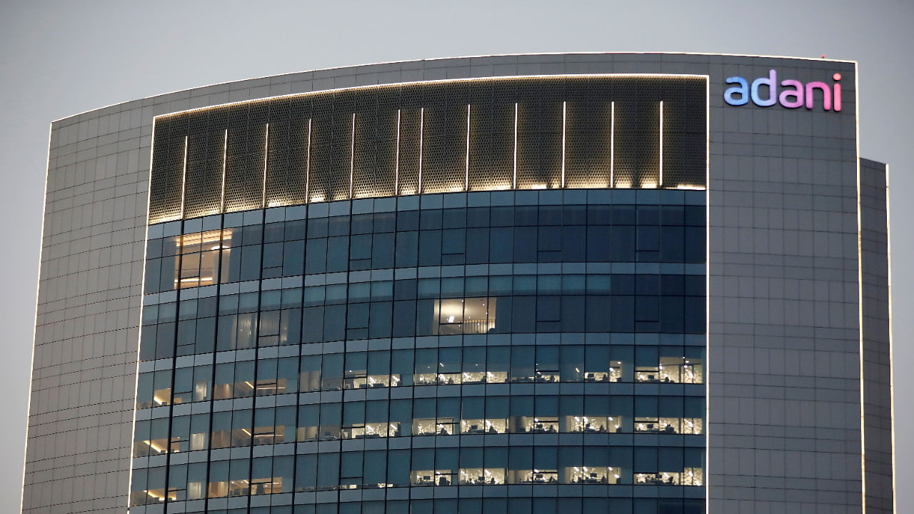 The logo of the Adani Group is seen on the facade of one of its buildings on the outskirts of Ahmedabad, India. Credit: Reuters File Photo