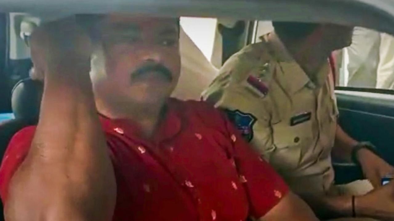 Telangana BJP MLA T Raja Singh being taken away after he was arrested for allegedly making derogatory remarks against Prophet Mohammed, in Hyderabad, Tuesday, Aug 23, 2022. Credit: PTI Photo