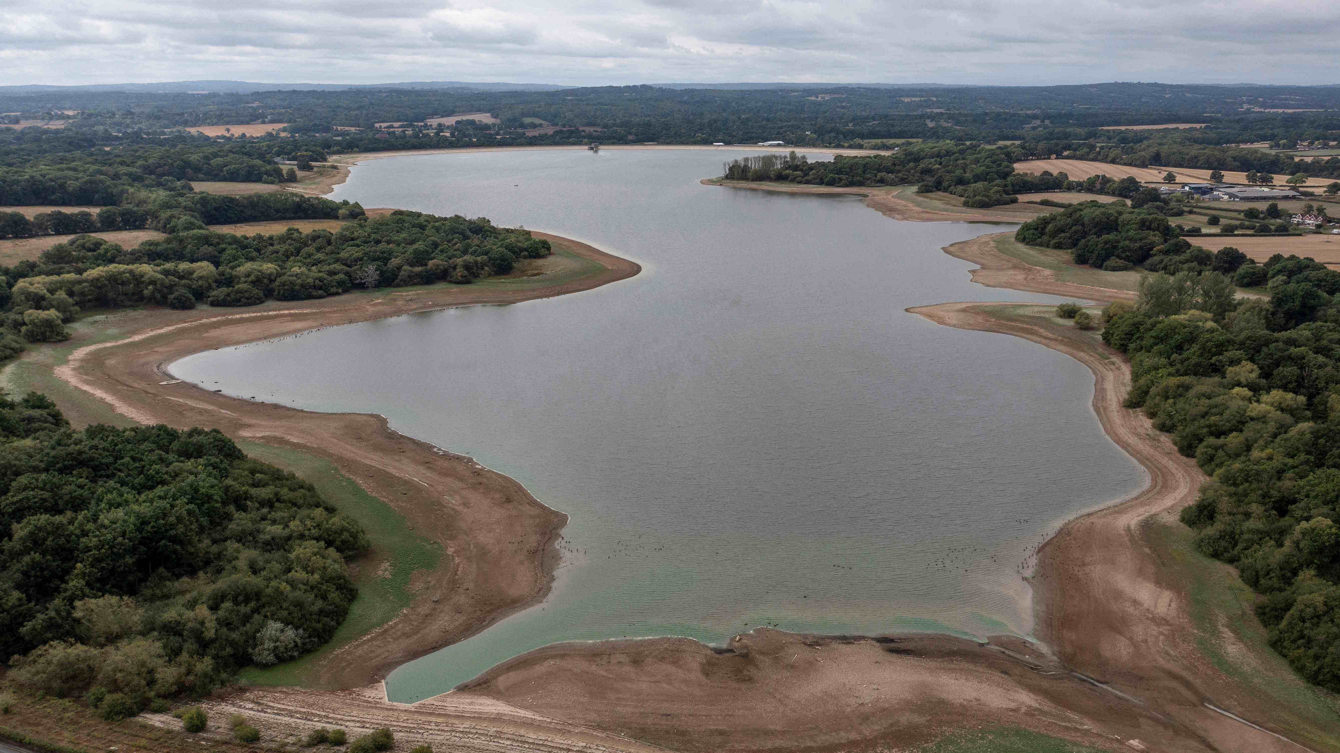 An aerial picture shows low water levels in the Bough Beech Reservoir in Kent. Credit: AFP Photo