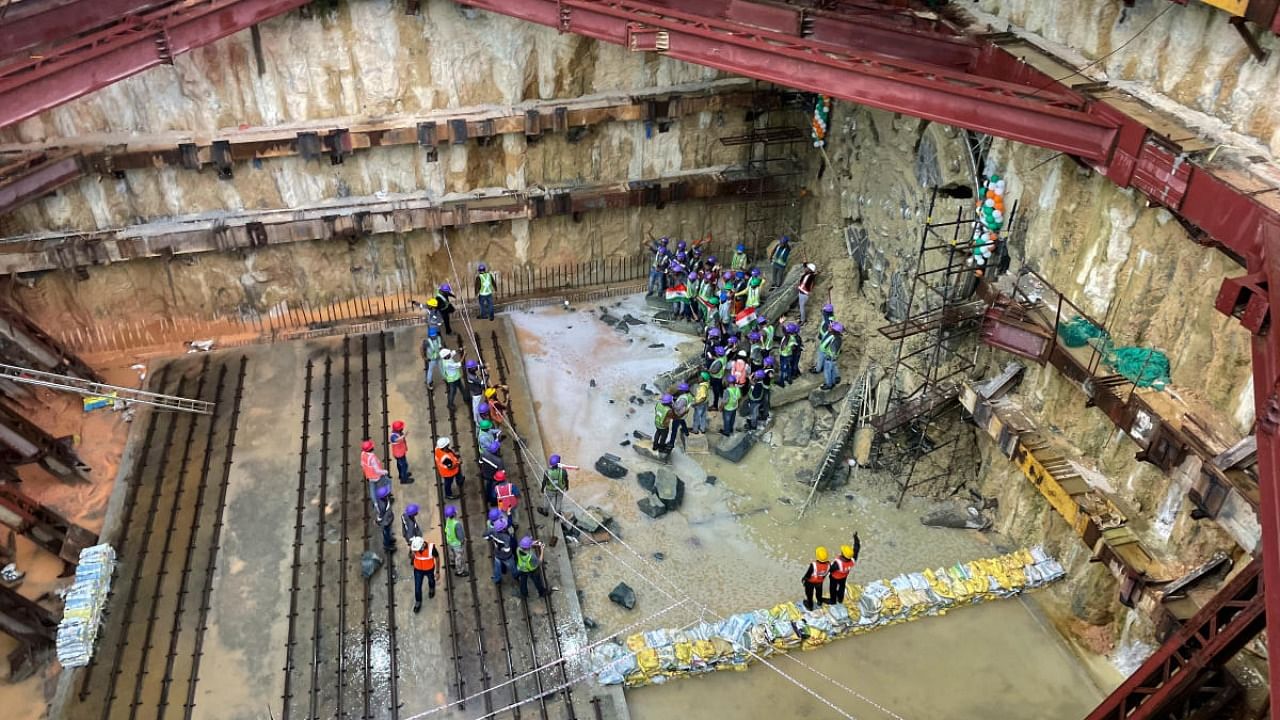 Metro construction workers celebrates as TBM Tunga achieve breakthrough at Shadi Mahal near Tannery Road. Credit: DH Photo