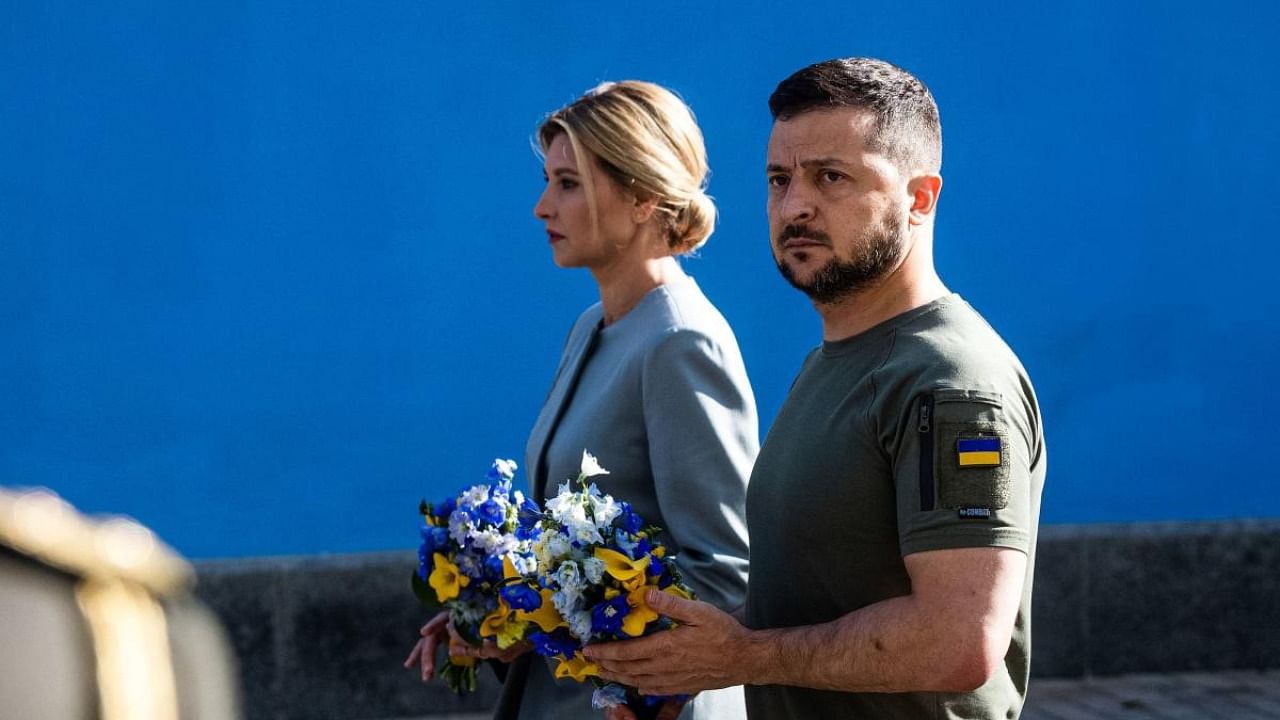 Ukrainian President Volodymyr Zelenskyy and his wife Olena attend a commemoration ceremony of Ukrainian servicemen and servicewomen killed since Russia launched a military invasion on the country. Credit: AFP Photo/Ukrainian presidential press service