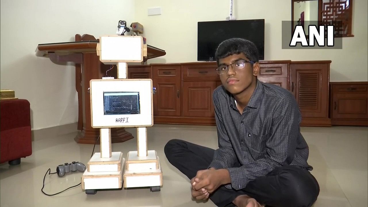 Prateek is seen with his robot 'Raffi'. Credit: Twitter/ @ANI