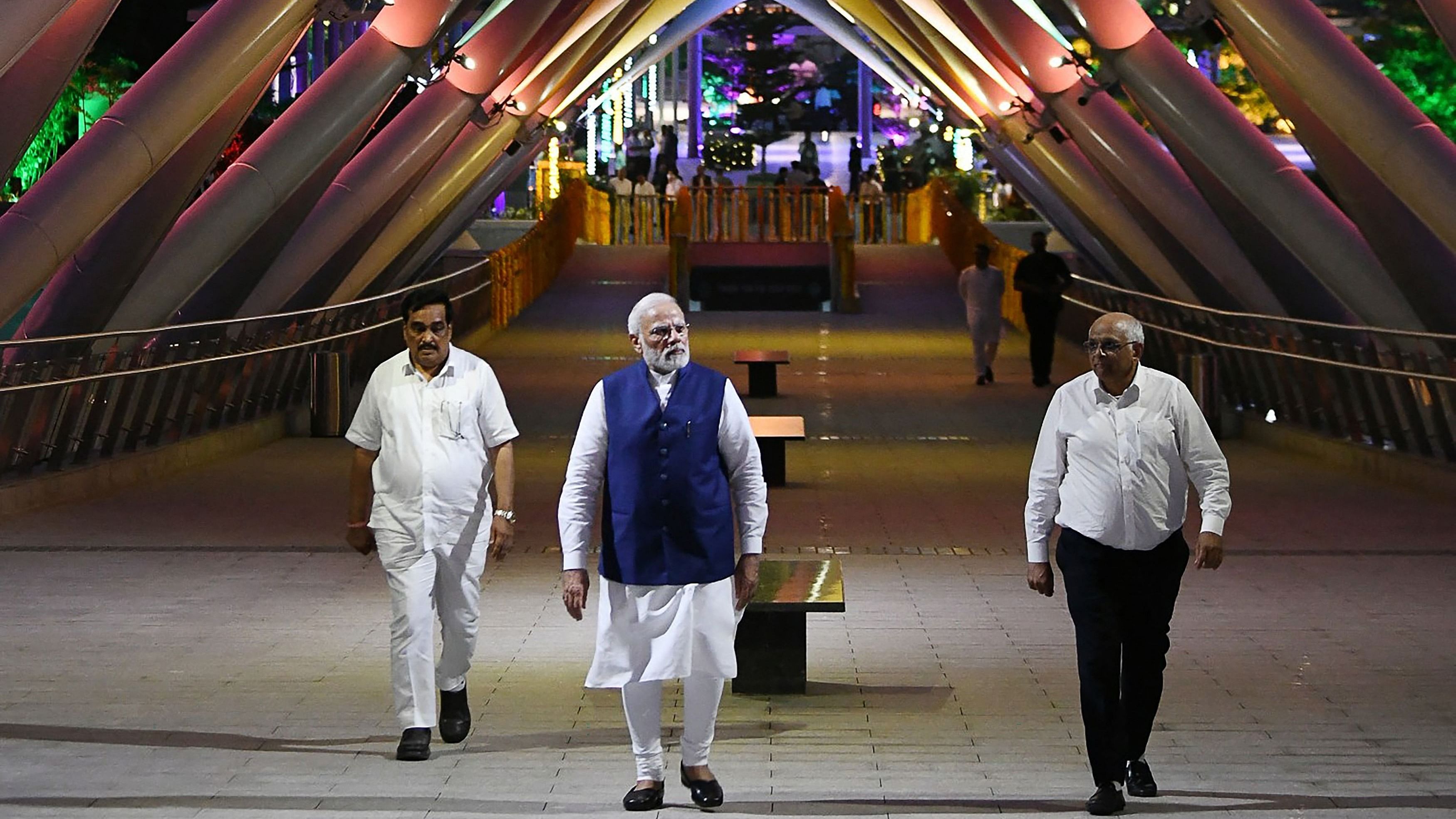 PM Modi walks during the inauguration of Atal Bridge. Credit: AFP Photo