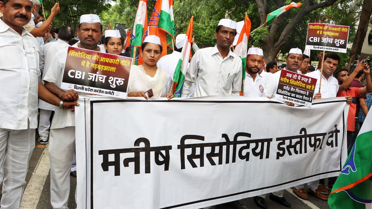 Delhi Pradesh Congress Committee members stage a protest and demand the resignation of Manish Sisodia on Saturday August 20, 2022. Credit: IANS Photo