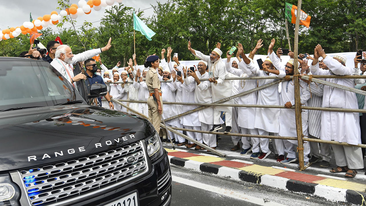 Prime Minister Narendra Modi waves at supporters in Bhuj, Gujarat. Credit: PTI Photo
