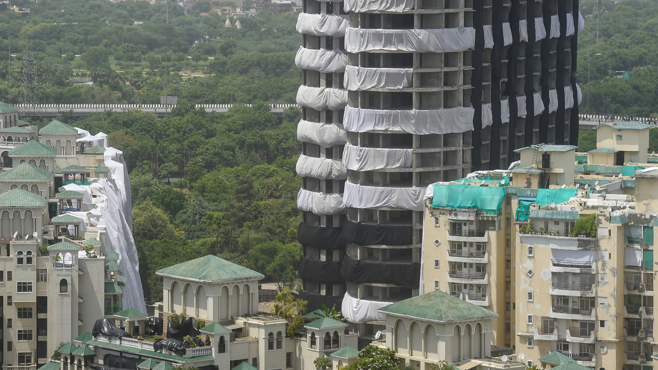 Balconies, doors and windows of residential apartments covered, ahead of the demolition of Supertech twin towers in Noida. Credit: PTI Photo