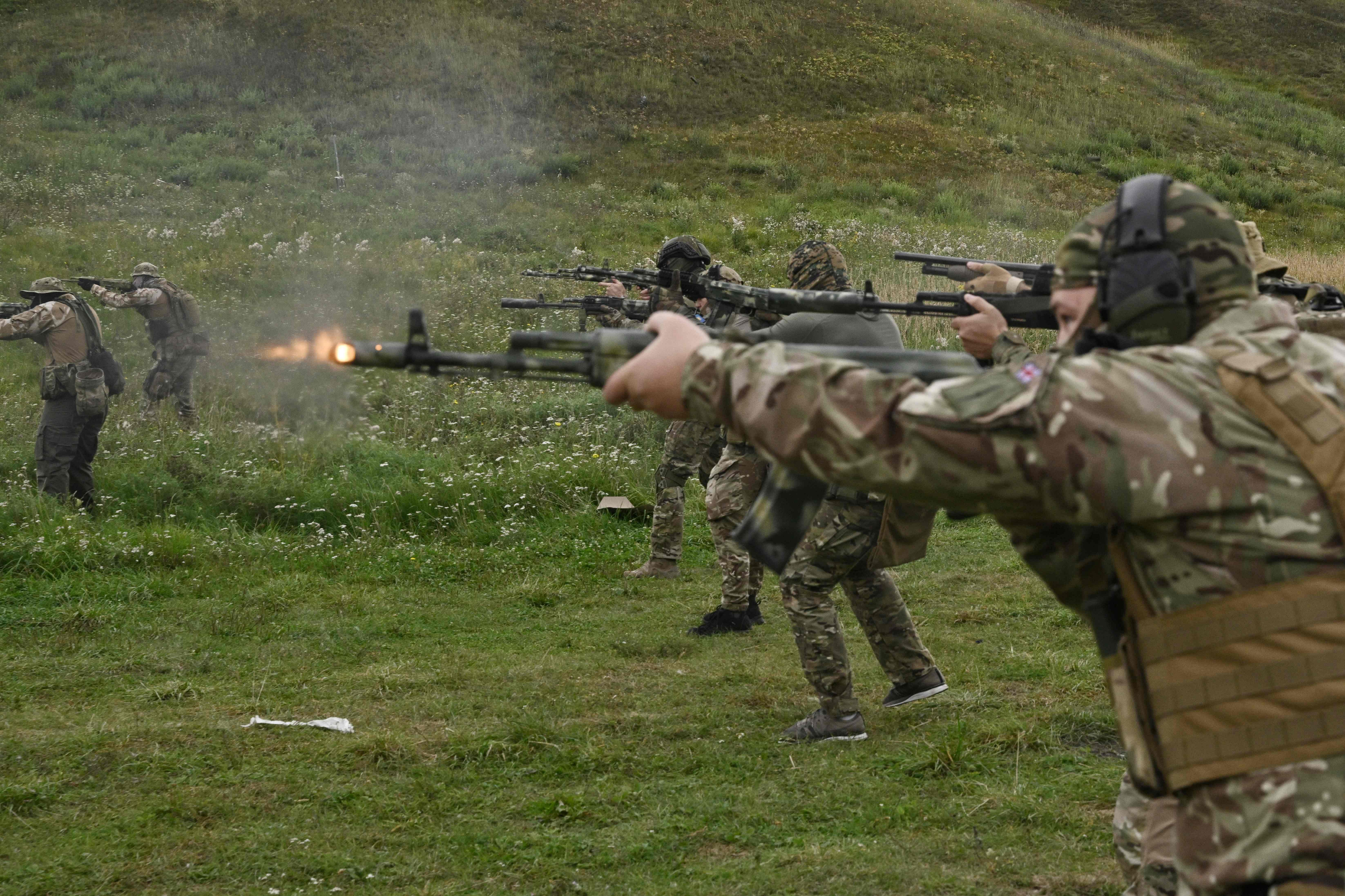 New members of the Dzhokhar Dudayev Chechen volunteer battalion take part in a training session in the Kyiv region. Credit: AFP Photo