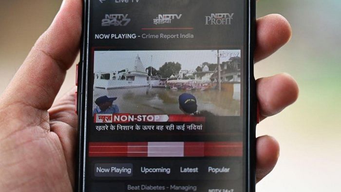 Phone shows NDTV mobile app. Credit: AFP photo