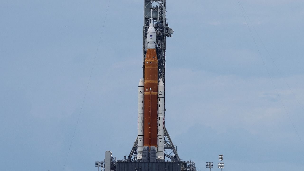 NASA's next-generation moon rocket, the Space Launch System (SLS) rocket with its Orion crew capsule perched on top, stands on launch pad 39B at Cape Canaveral. Credit: Reuters photo