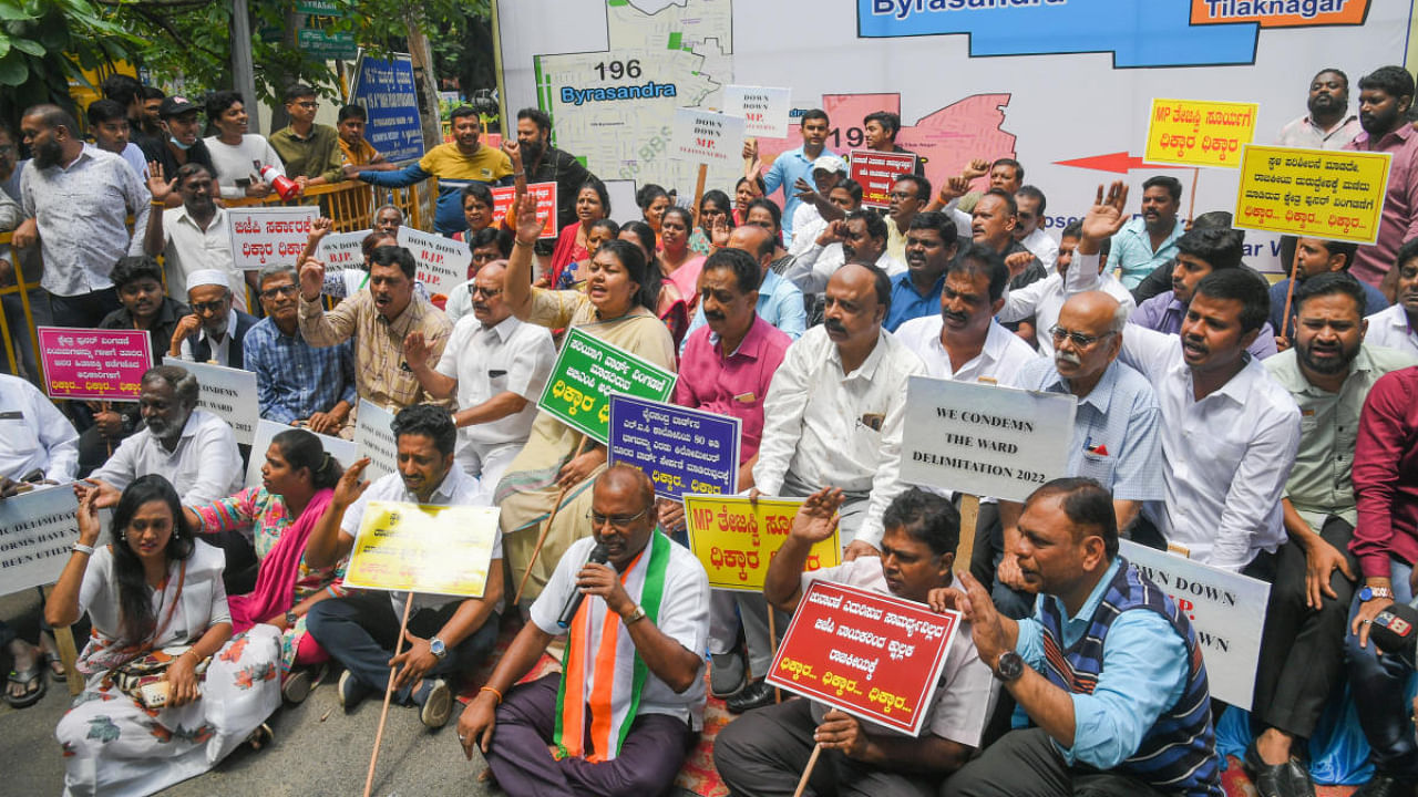 Soumya Reddy, Nagraj, Mohammed Rizwan, Congress party leaders, workers and residents stage a protest against the unscientific delimitation of wards by BBMP at Tilaknagar in Bengaluru on Wednesday, June 29, 2022. DH Photo/ S K Dinesh