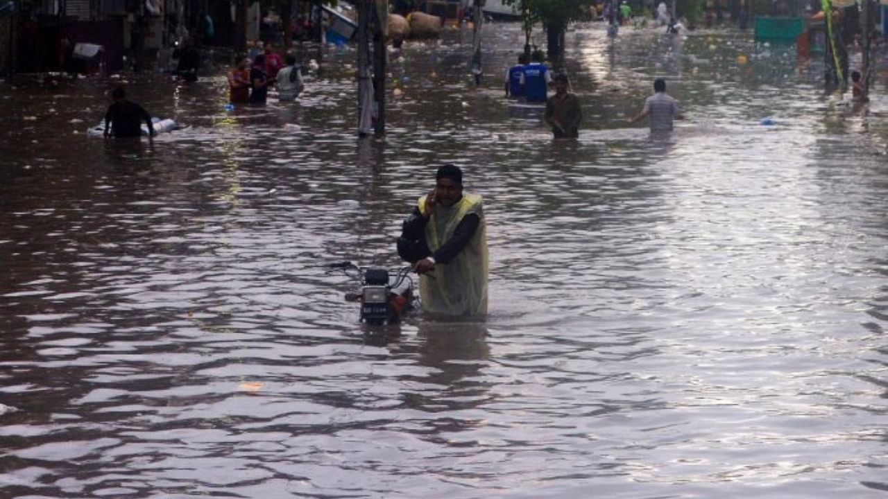 The flooding has all the hallmarks of a catastrophe juiced by climate change, but it is too early to formally assign blame to global warming, scientists say. Credit: AFP Photo