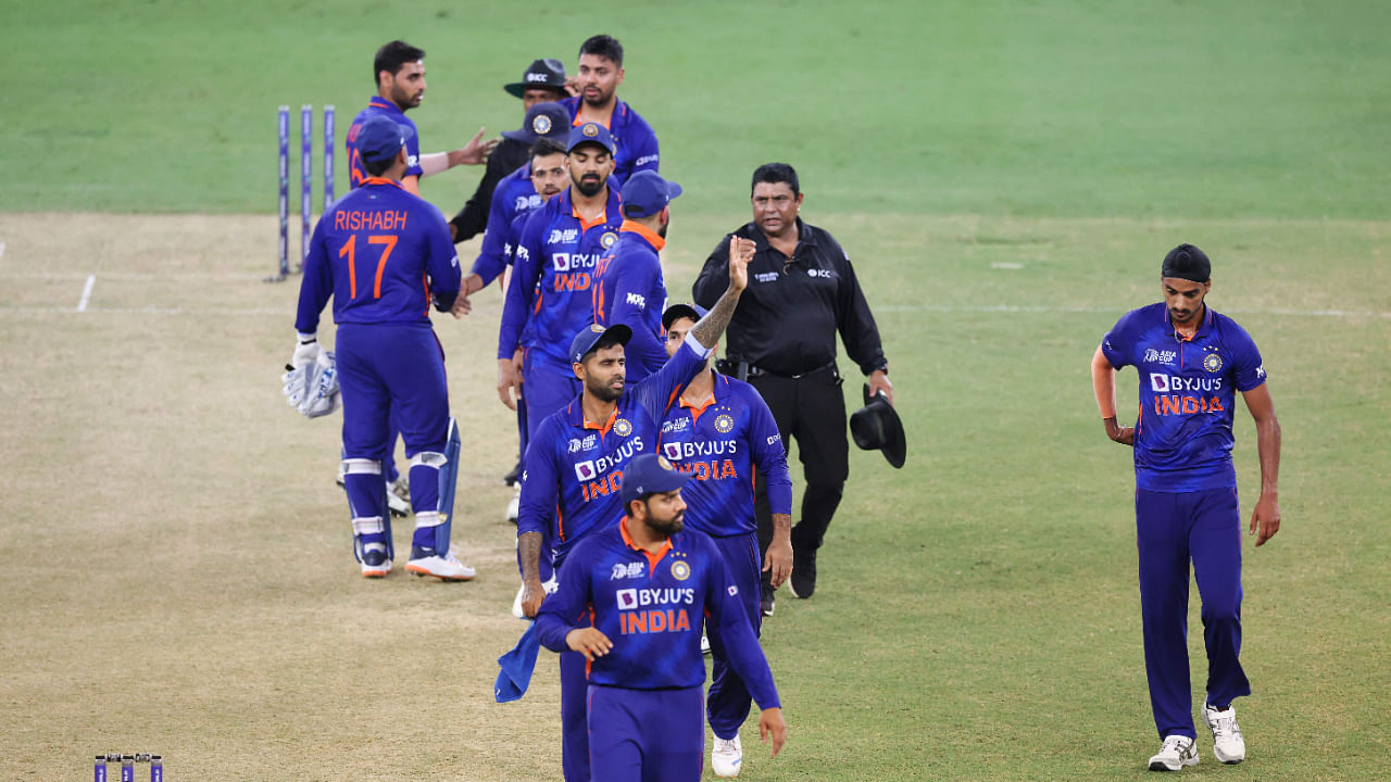 India's players leave the field after wnning the Asia Cup Twenty20 international cricket match between India and Hong Kong at the Dubai International Cricket Stadium in Dubai on August 31, 2022. Credit: AFP Photo