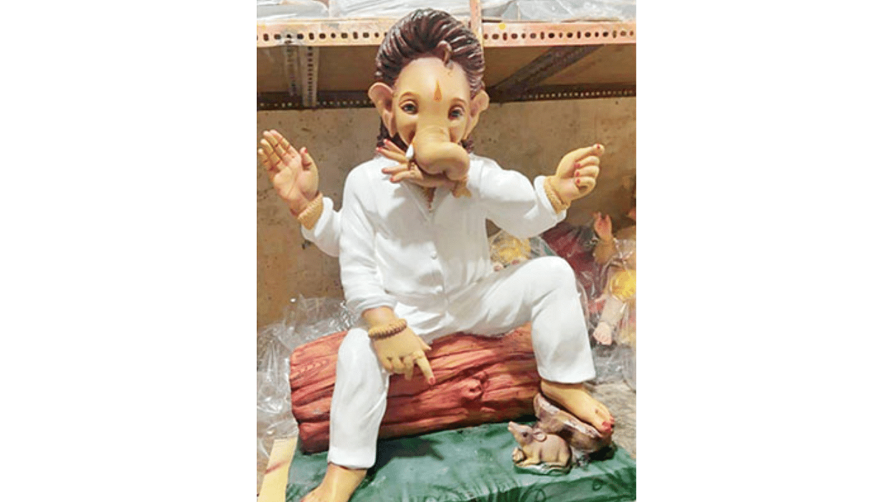 With southern movies on a winning spree, it is not surprising to see Ganesha idol versions of star cousins Allu Arjun and Ram Charan popular in pandals across India. Credit: Twitter/ @ANI