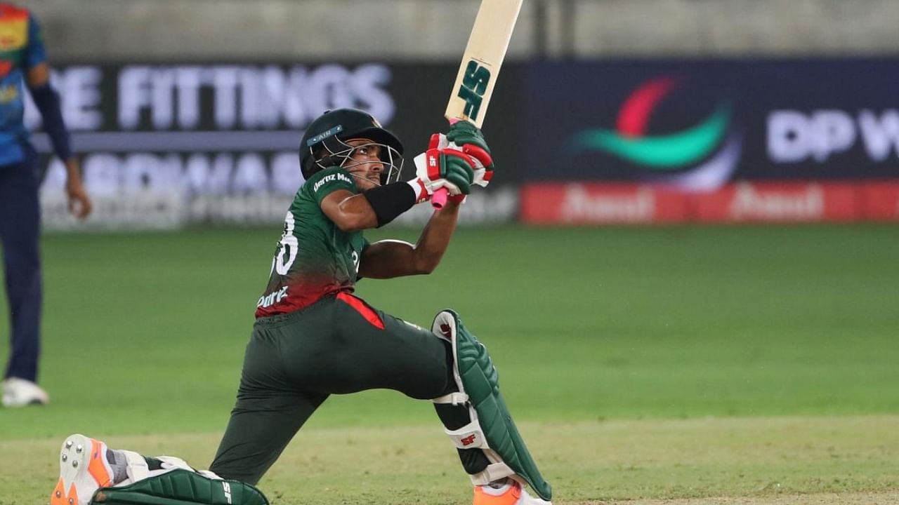 Bangladesh's Afif Hossain hits a boundary during the Asia Cup Twenty20 international cricket match between Bangladesh and Sri Lanka. Credit: AFP Photo