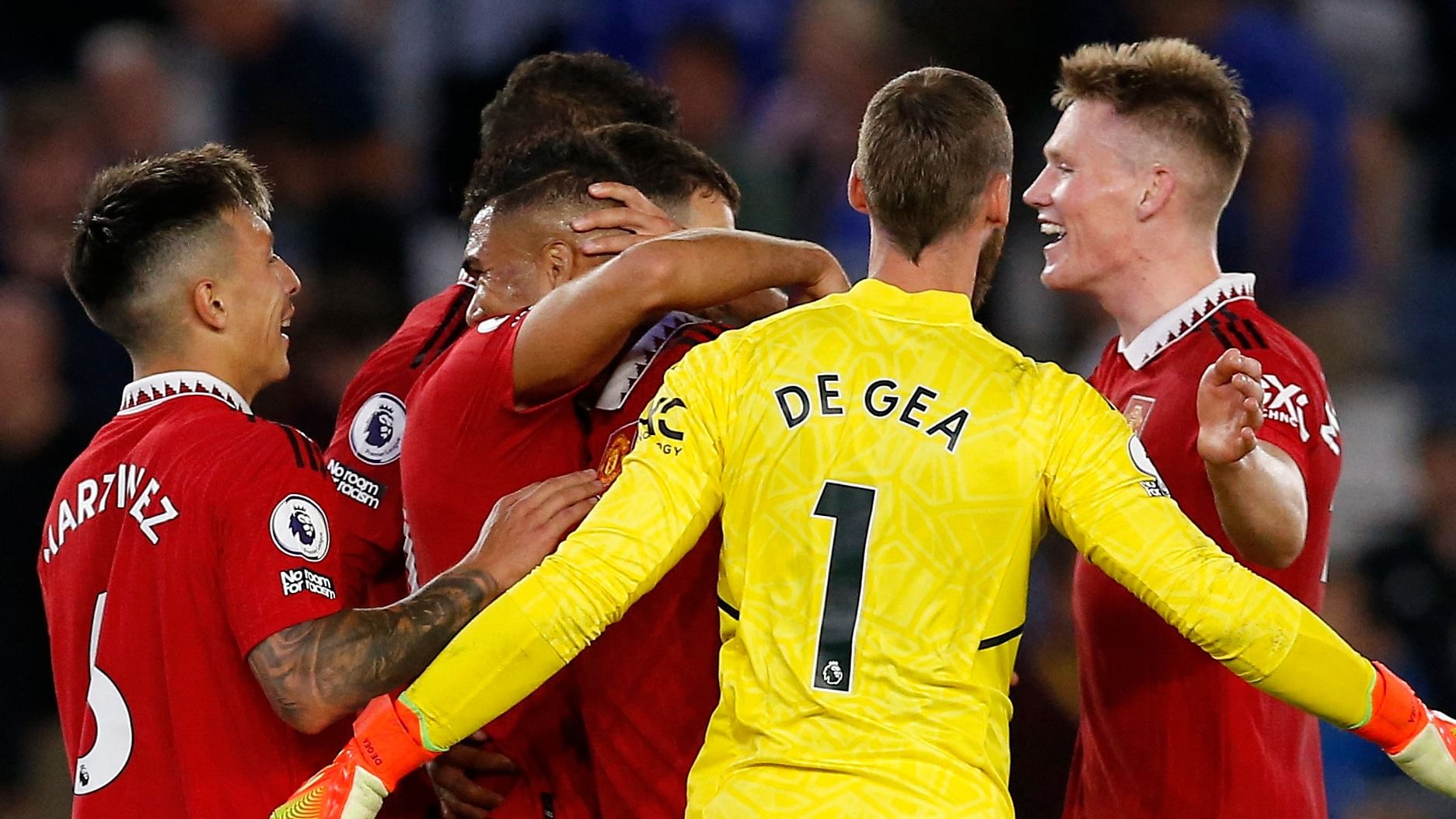 Manchester United's David de Gea, Casemiro, Lisandro Martinez, and Scott McTominay celebrate after the match. Credit: Reuters Photo