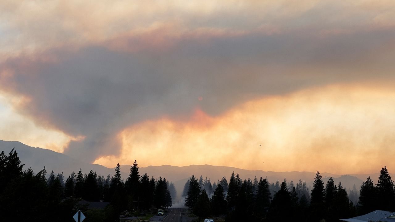 Smoke billows from the mountain fire near Weed, California, US. Credit: Reuters Photo