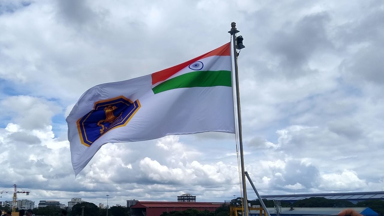 Indian Navy flag flying atop INS Vikrant. Credit: DH Photo/ Kalyan Ray