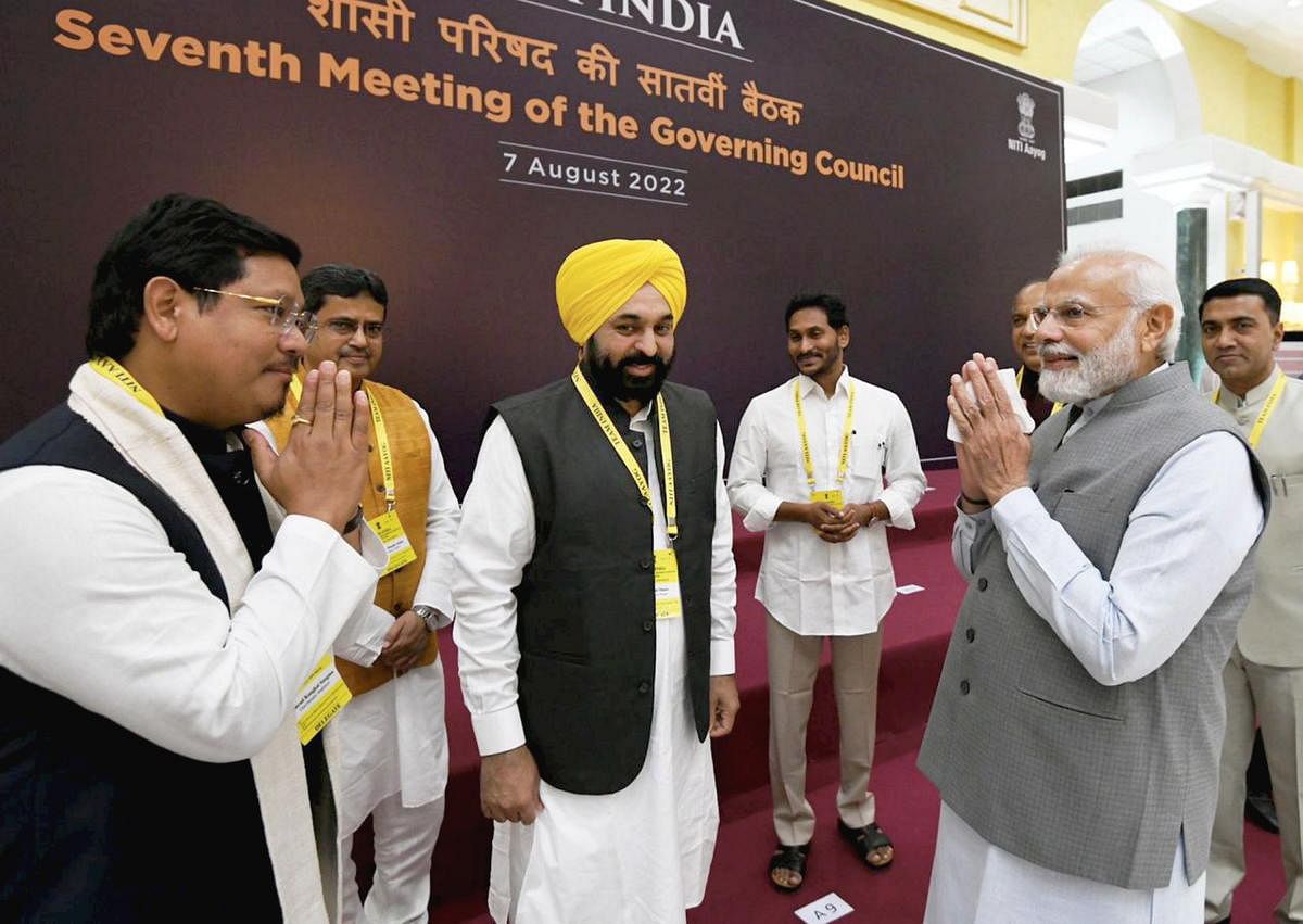 Prime Minister Narendra Modi meets Meghalaya CM Conrad Sangma and Punjab CM Bhagwant Mann at a recent NITI Aayog meeting in New Delhi. PTI file photo