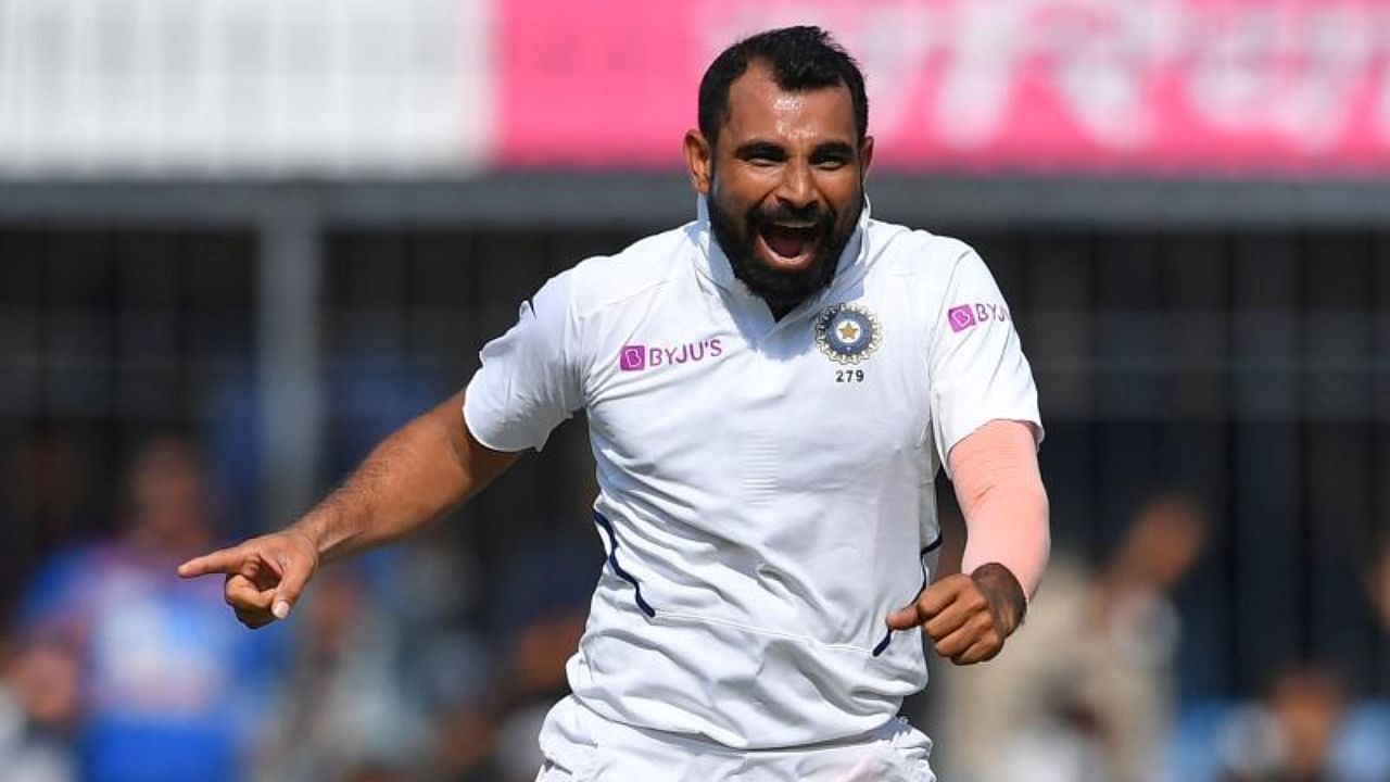 Mohammed Shami celebrates after the dismissal of Bangladesh's Mushfiqur Rahim during the first day of the first Test cricket match between India and Bangladesh at the Holkar Cricket Stadium in Indore. Credit: AFP file photo