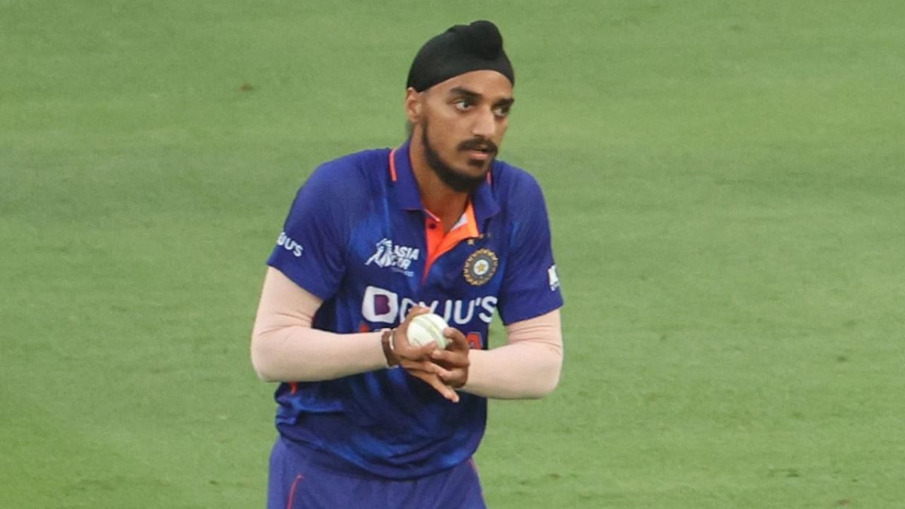 Arshdeep Singh takes a catch to dismiss Pakistan's captain Babar Azam (not pictured) during the Asia Cup Twenty20 international cricket Group A match between India and Pakistan at the Dubai International Cricket Stadium in Dubai on August 28, 2022. Credit: AFP Photo