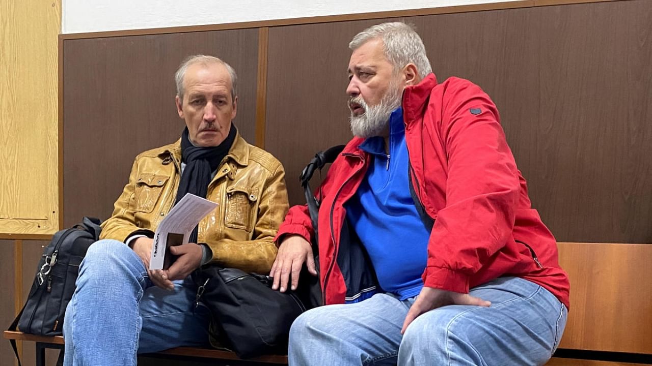 Novaya Gazeta newspaper's editor-in-chief Muratov and deputy editor-in-chief Sokolov attend a court hearing in Moscow. Credit: Reuters Photo