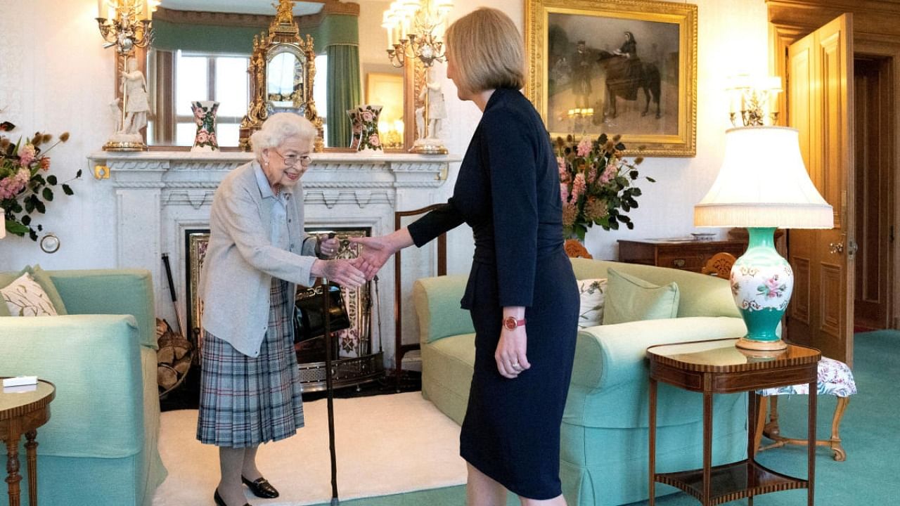Queen Elizabeth welcomes Liz Truss during an audience where she invited the newly elected leader of the Conservative party to become Prime Minister and form a new government, at Balmoral Castle, Scotland. Credit: Reuters photo