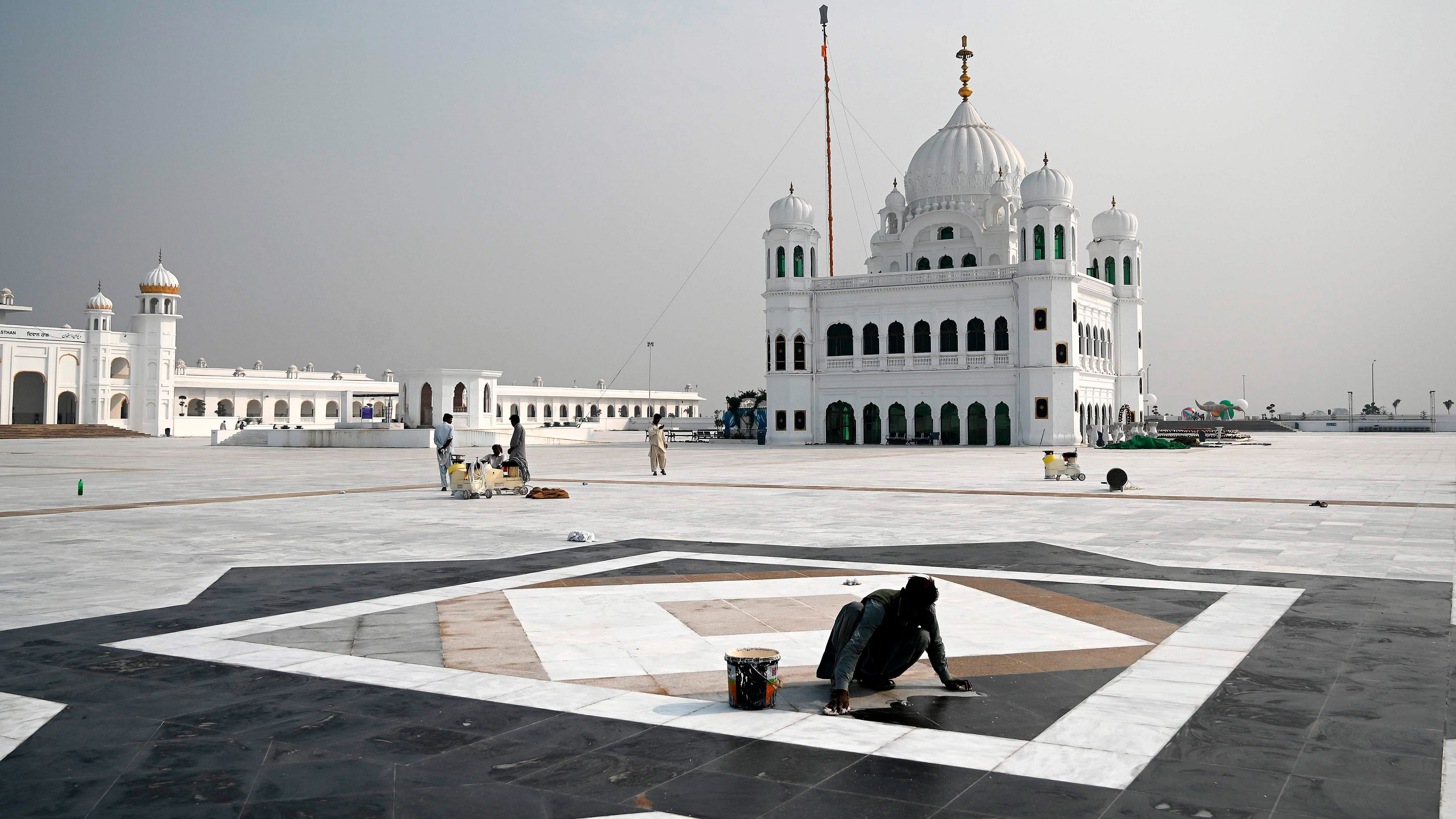 Pawan Kumar and his grandmother visited Gurdwara Darbar Sahib via the visa-free Kartarpur Corridor, which links the final resting place of Sikhism founder Guru Nanak Dev. Credit:  PTI Photo