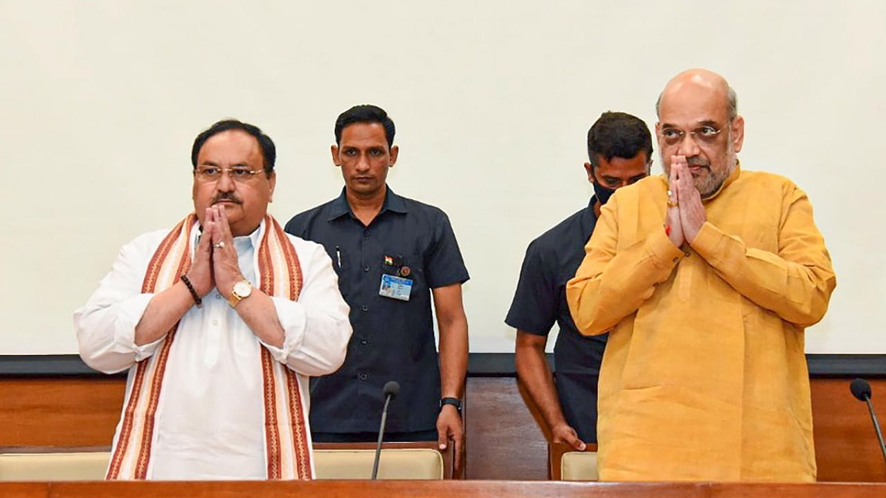 Union Home Minister Amit Shah with BJP National President JP Nadda during a meeting of senior party leaders for the 2024 Lok Sabha elections. Credit: PTI Photo