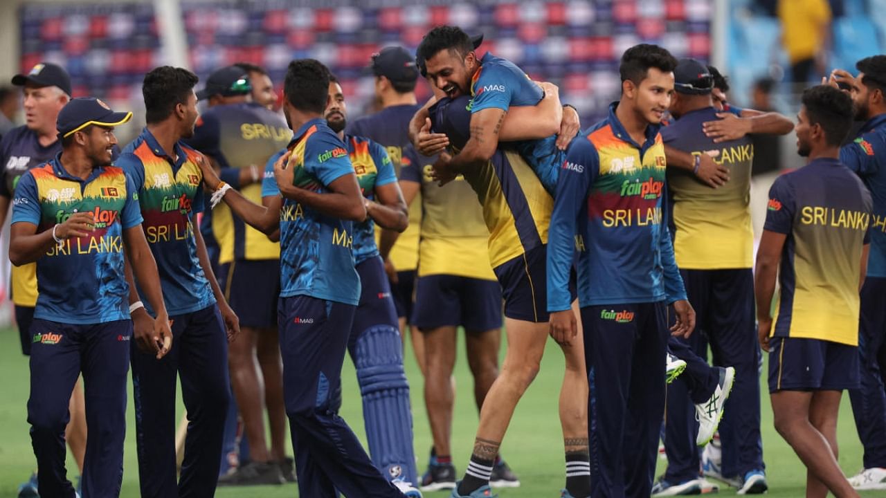 Sri Lanka celebrate after winning the match. Credit: Reuters Photo