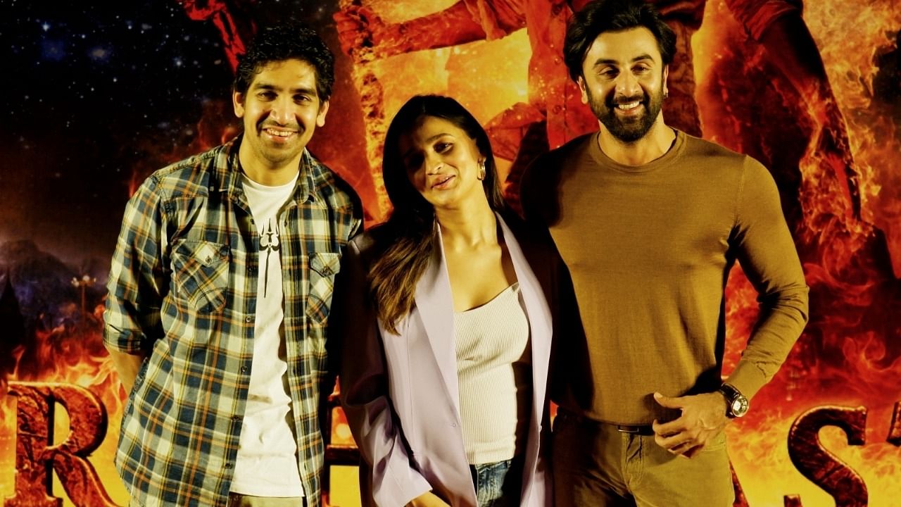 Bollywood film director Ayan Mukherji with actor Ranbir Kapoor and actress Alia Bhatt. Credit: IANS Photo